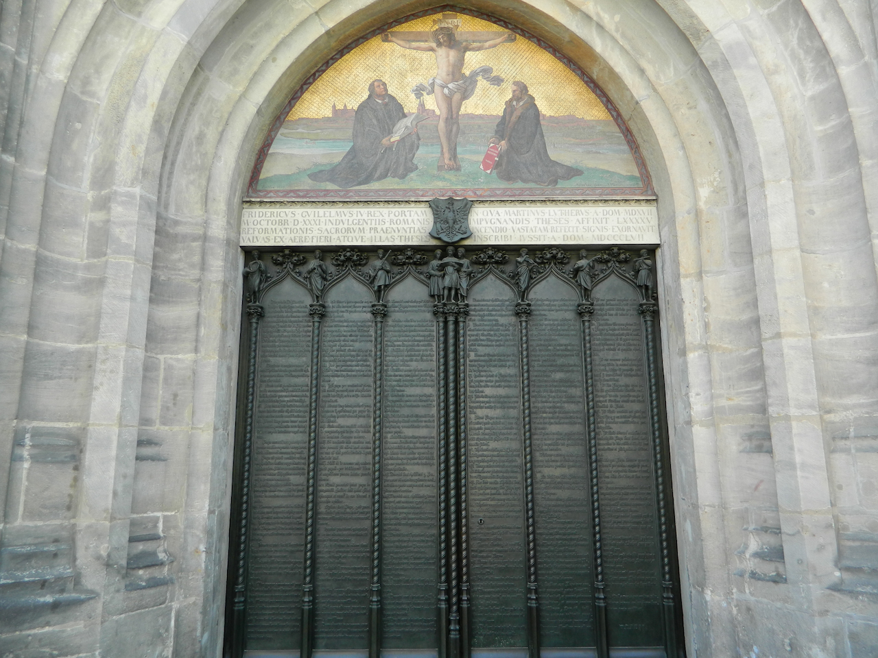 The bronze 95 Theses doors of the Wittenberg Castle Church today.